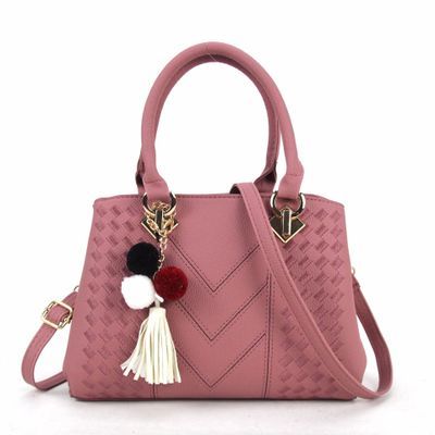 Chic and Versatile Woven Handbag with Tassel Charm - Courbe et Compagnie