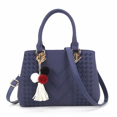 Chic and Versatile Woven Handbag with Tassel Charm - Courbe et Compagnie