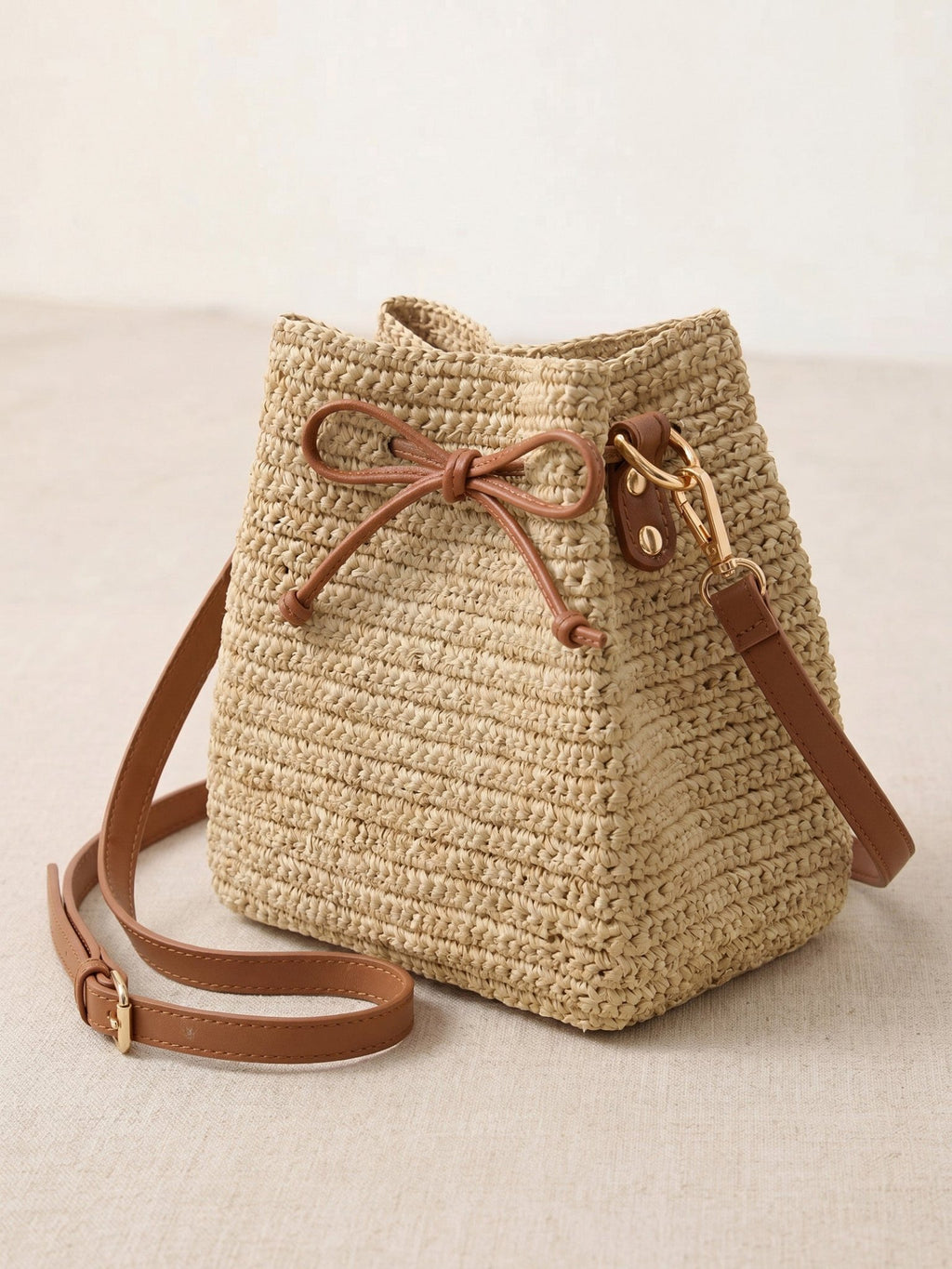 Mini Handwoven Raffia Drawstring Crossbody Bag - Courbe et Compagnie