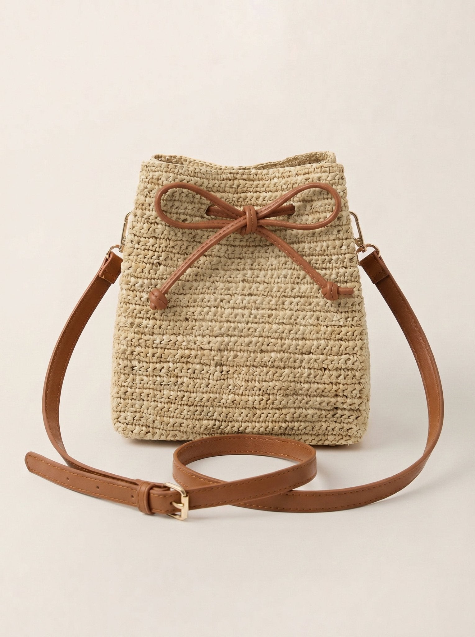 Mini Handwoven Raffia Drawstring Crossbody Bag - Courbe et Compagnie