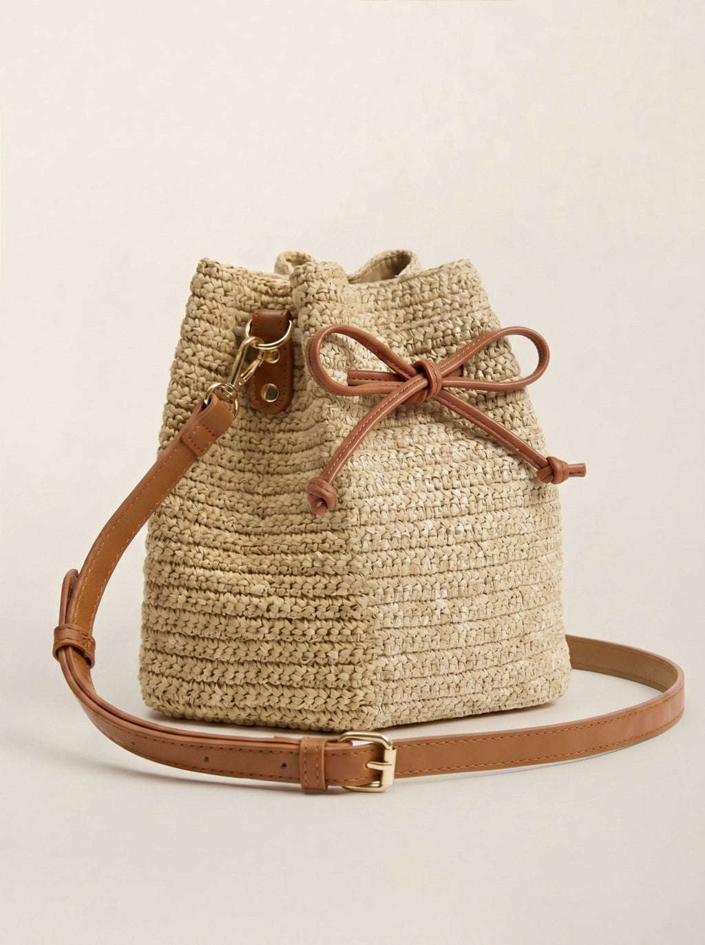 Mini Handwoven Raffia Drawstring Crossbody Bag - Courbe et Compagnie