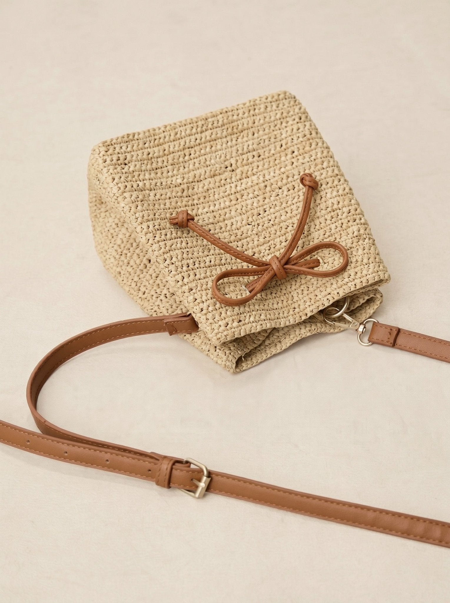 Mini Handwoven Raffia Drawstring Crossbody Bag - Courbe et Compagnie